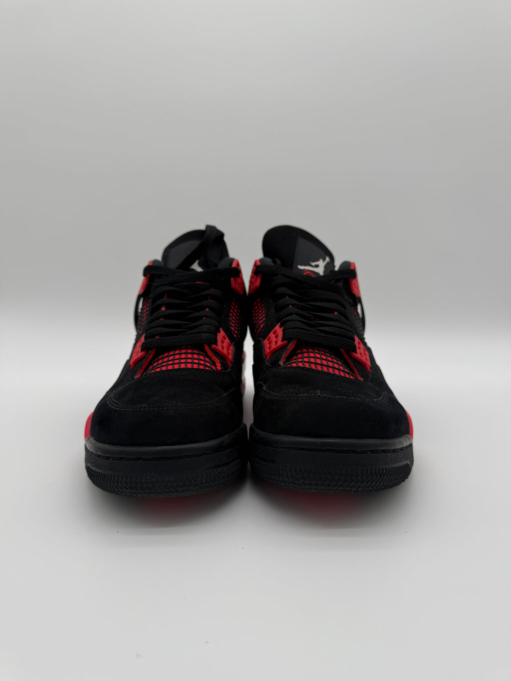 Nike Air Jordan 4 Retro “Red Thunder” – Men’s Size 10 (Lightly Worn)