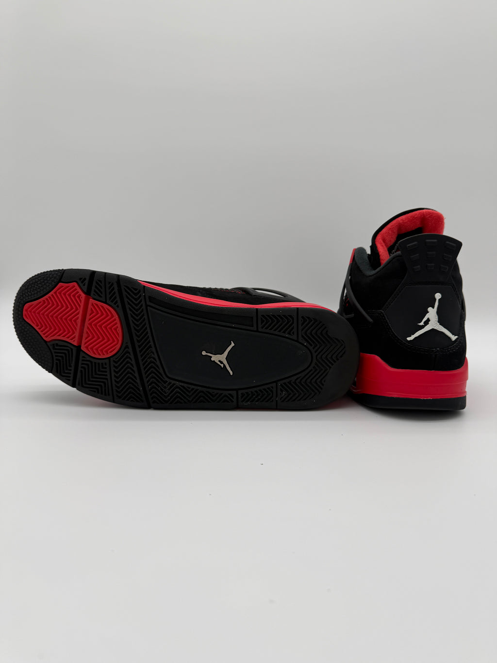 Nike Air Jordan 4 Retro “Red Thunder” – Men’s Size 10 (Lightly Worn)