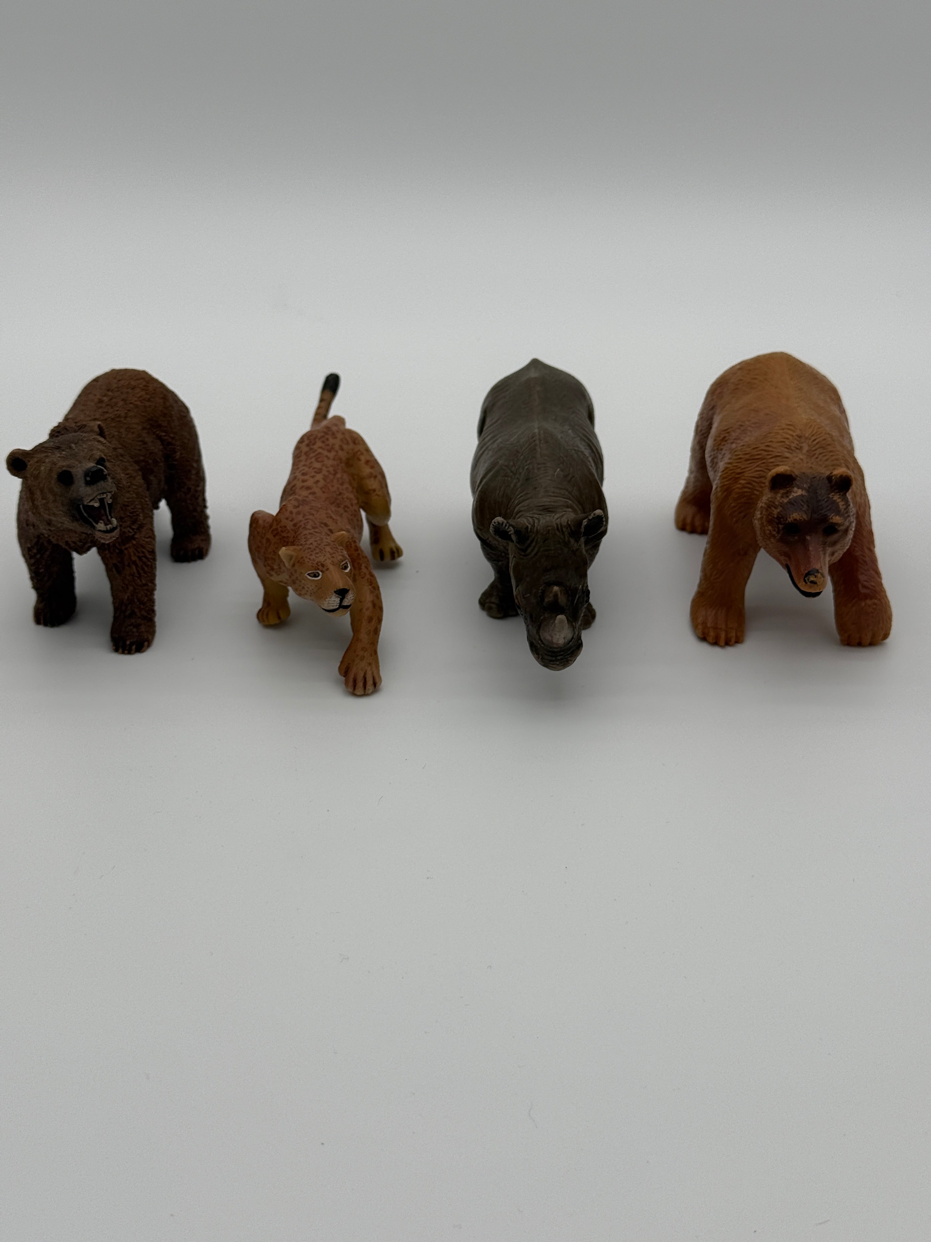 🐾 Wild Animal Toy Figurine Set – Bear, Lioness, Rhino, and Grizzly – Realistic Safari & Forest Animals (Set of 4)